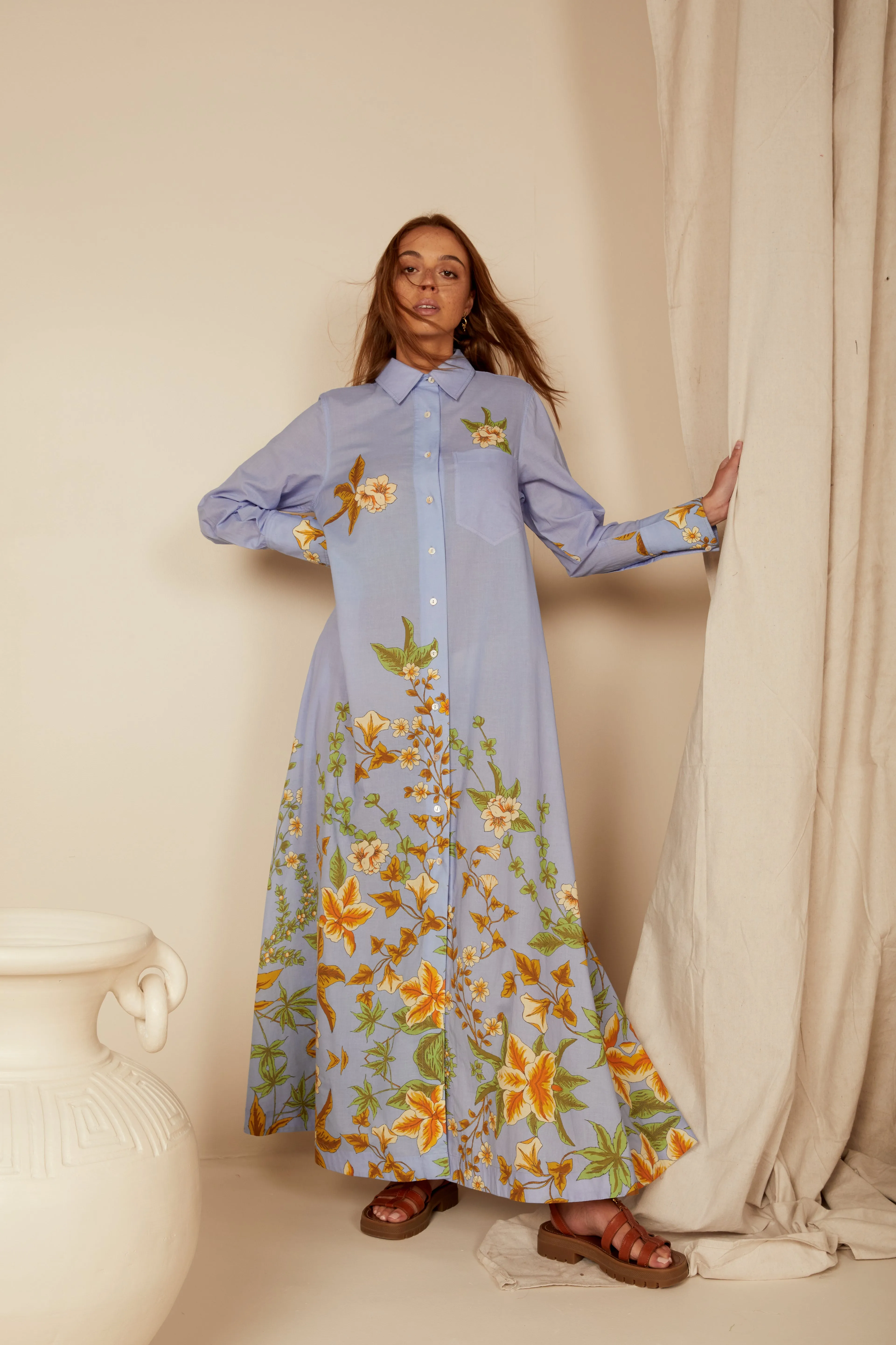 Certainly! Here’s an optimized title for the product:

Bohemian Traders Zinnia Floral Print Opera Shirt Dress - Elegant Summer Fashion for Women 

This title includes important modifiers and highlights key features to attract customers.